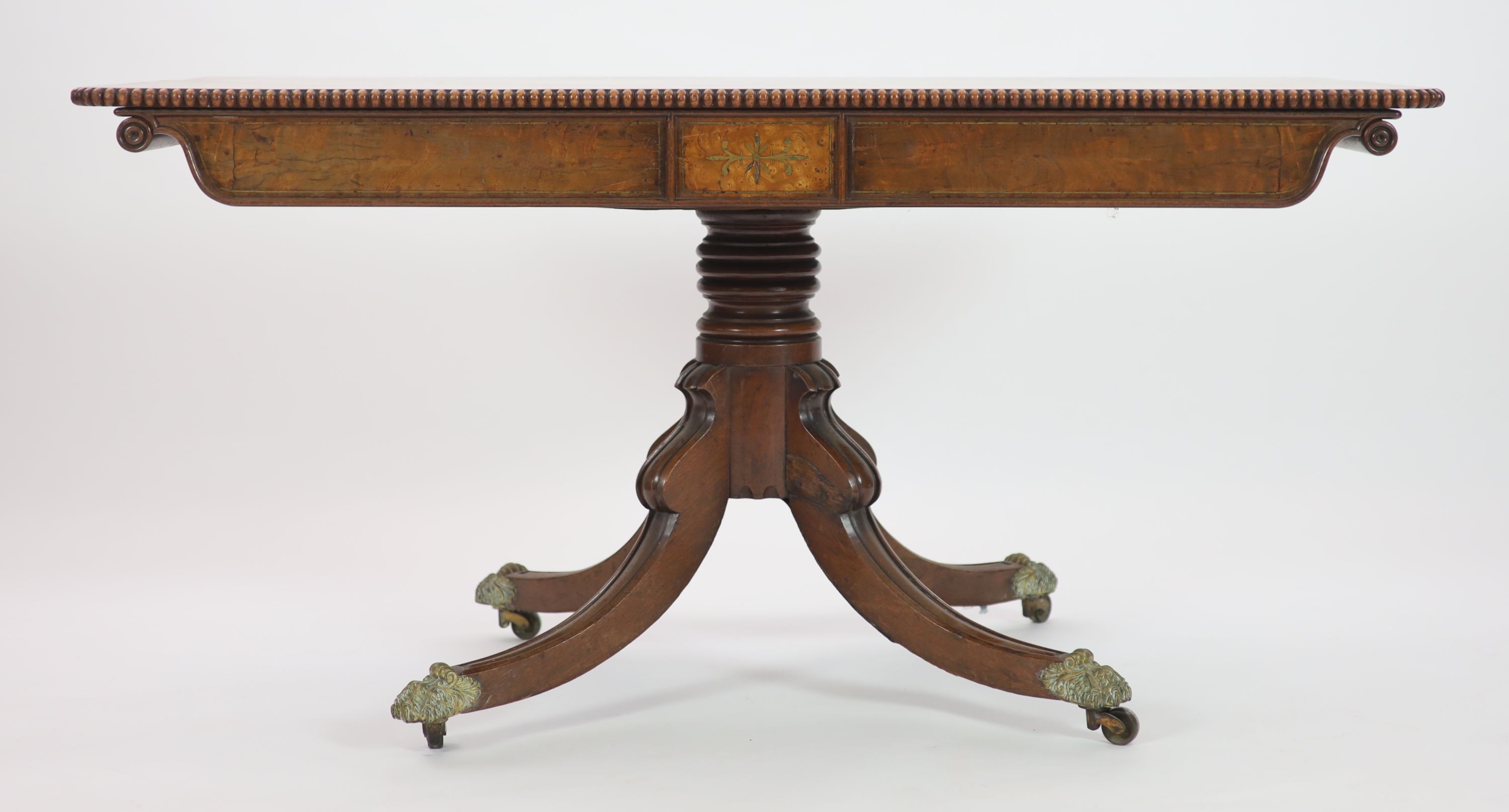 A Regency brass inlaid rectangular mahogany side table, length 136cm, depth 62cm, height 57cm